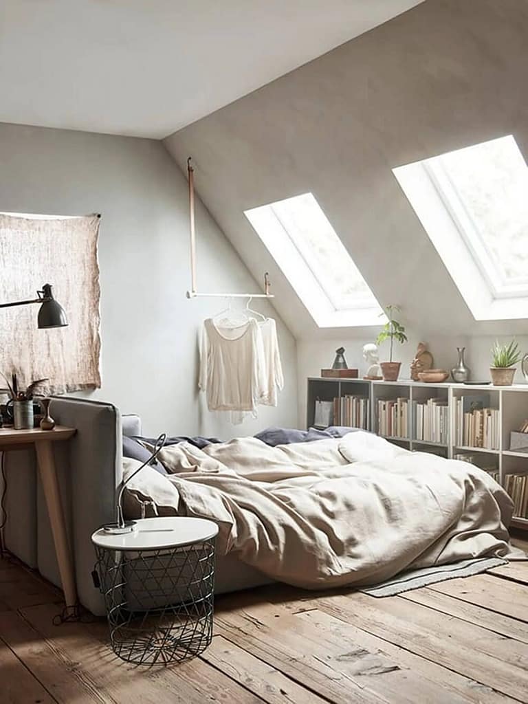 How to decorate a bedroom with slanted walls by maximizing natural light