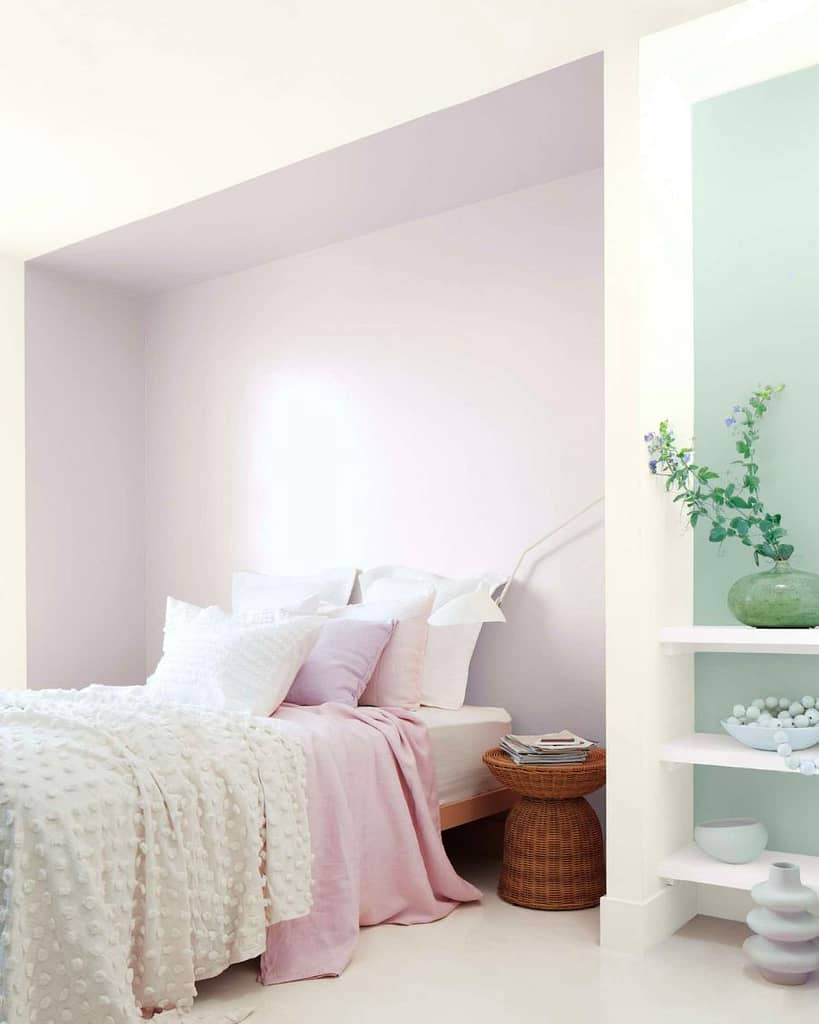 Light color walls and bedding for extra bedroom natural light