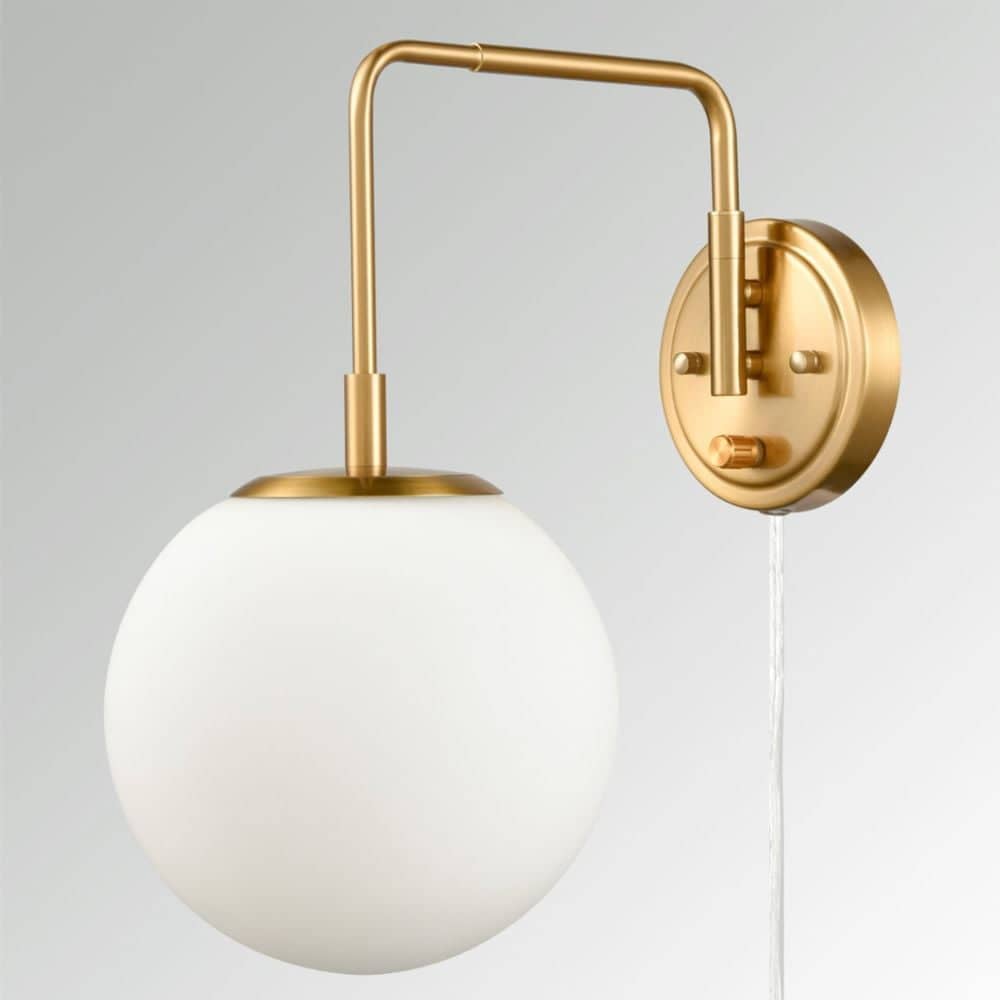 Product image of Claxy globe glass bedroom wall sconce in gold