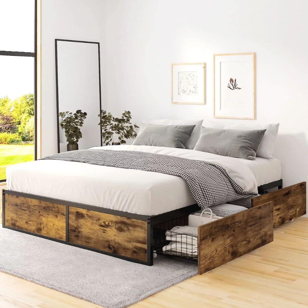 Platform bed with white sheets and a brown bed frame