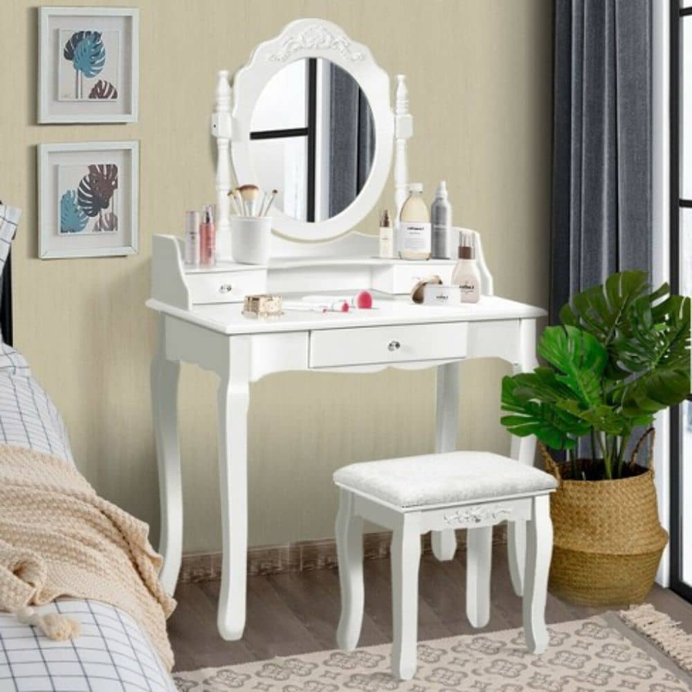 Vanity with a white wooden type of vanity stool in a white bedroom
