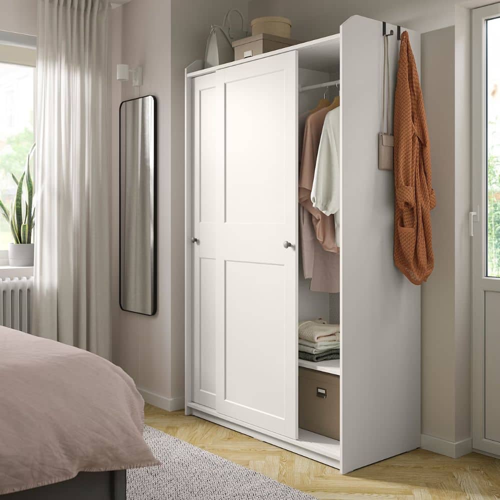 Different types of bedroom furniture includes this white wardrobe with a modern look 