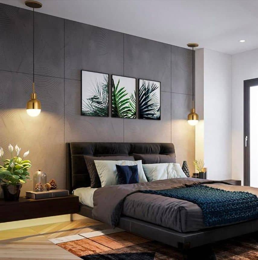 Primarily black bedroom decor with two warm white pendant lights