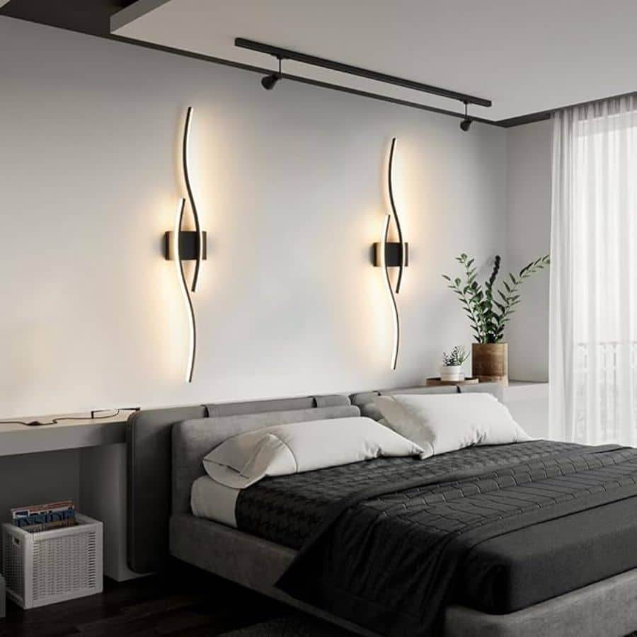 Best bedroom wall lights above a bed on a light gray wall